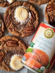 a close up of candied sweet potato cookies with a can of Farmer's Market Foods Organic Sweet Potato Puree
