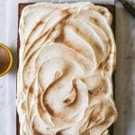 a shot of a full, frosted pumpkin sheet cake