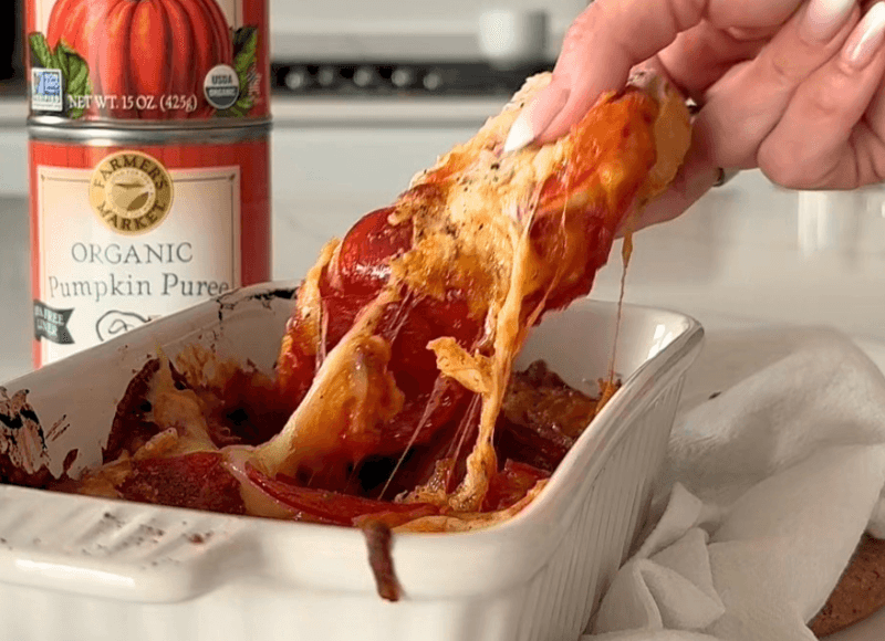 a dish of pumpkin pizza dip with a can of Farmer's Market Foods Organic Pumpkin Puree